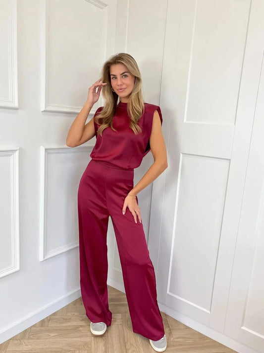 Juna – Elegante rugloze jumpsuit met wijde pijpen